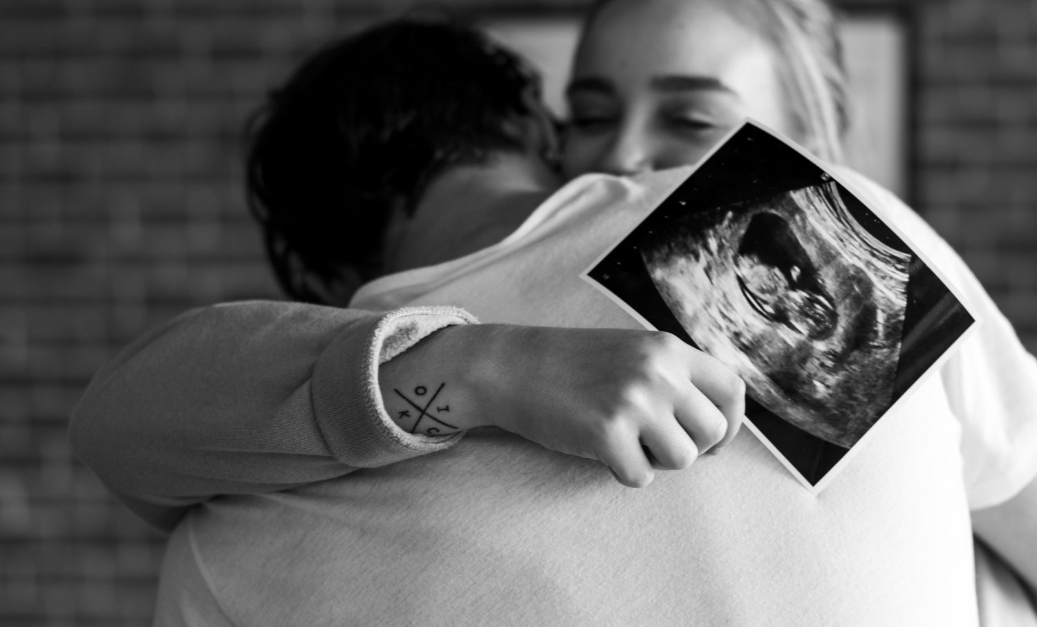 Casal durante consulta pré-natal
